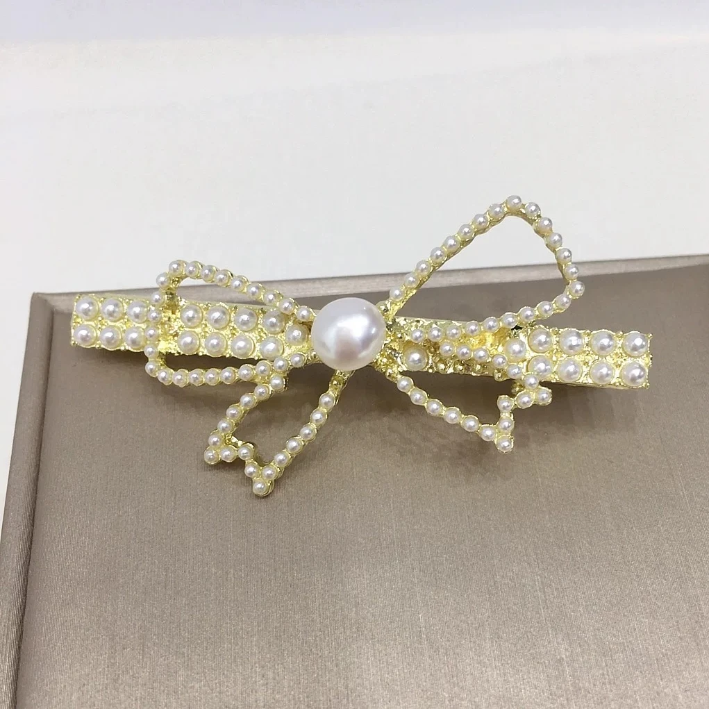 166  DF新款蝴蝶结珍珠发夹