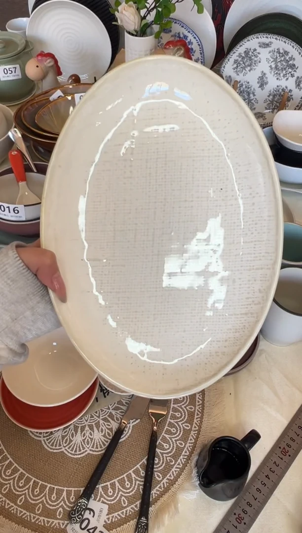 新骨瓷099瑕疵洛娃白麻布11寸椭圆盘