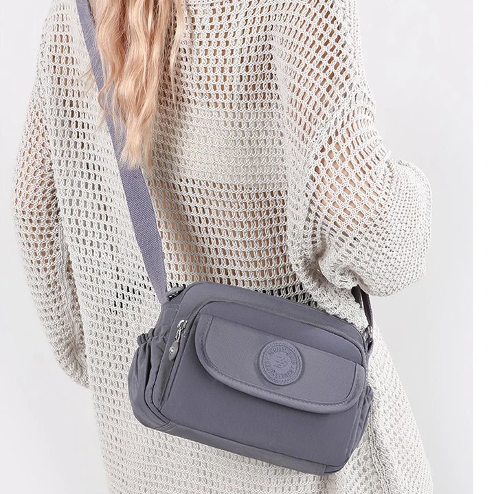 新款水洗牛津布多隔层实用日常出行斜跨包