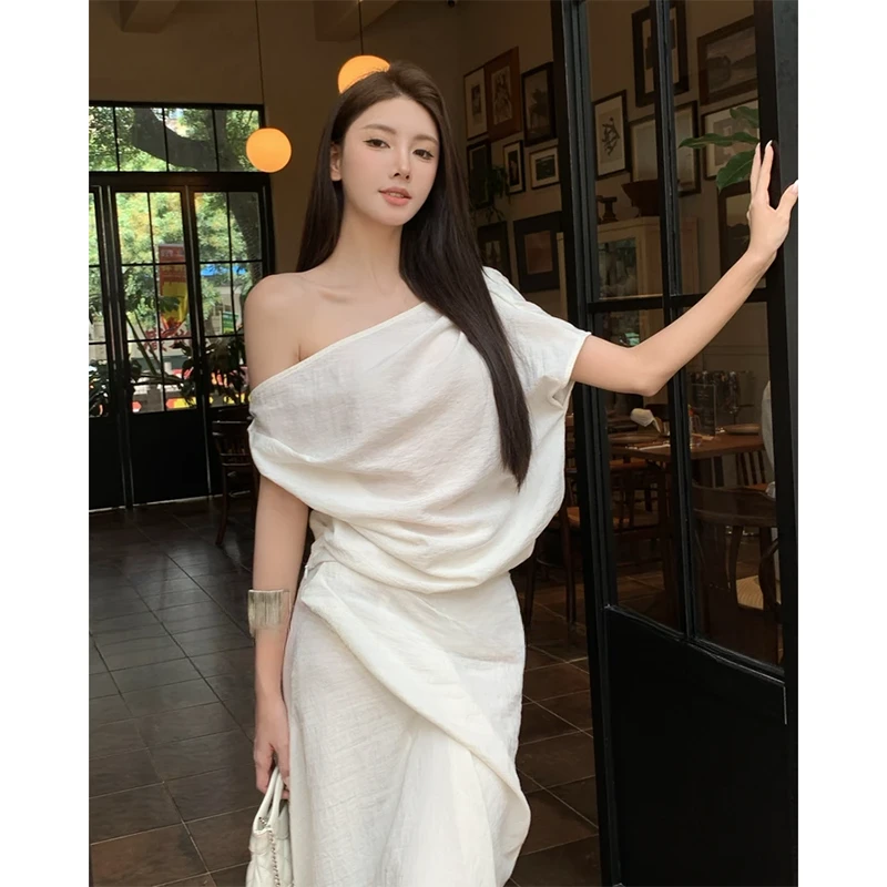 白色老钱风气质显瘦时尚套装女夏季新款不规则上衣小众收腰半身裙