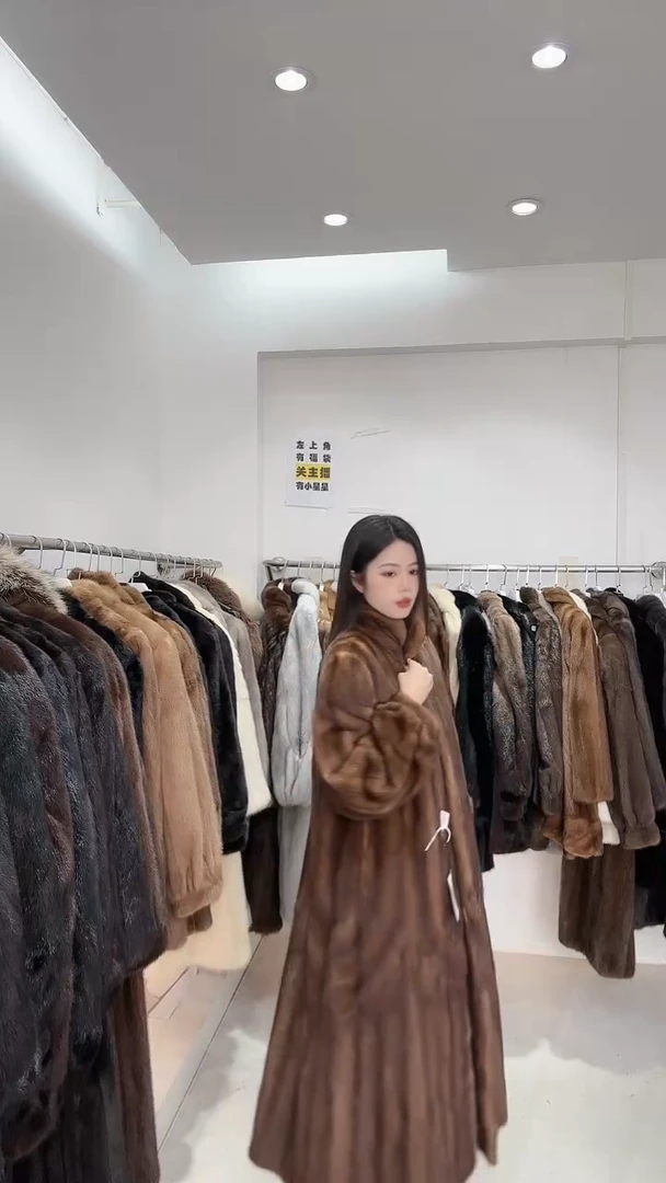 小橙子皮草直博间