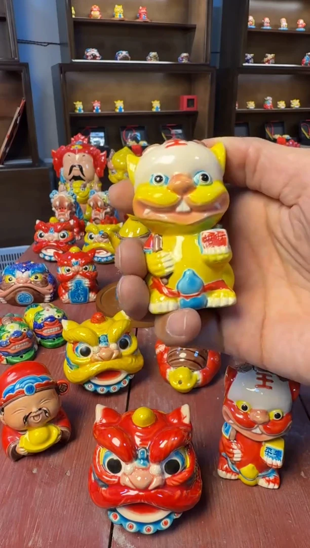 陶瓷丑萌喜狮1111