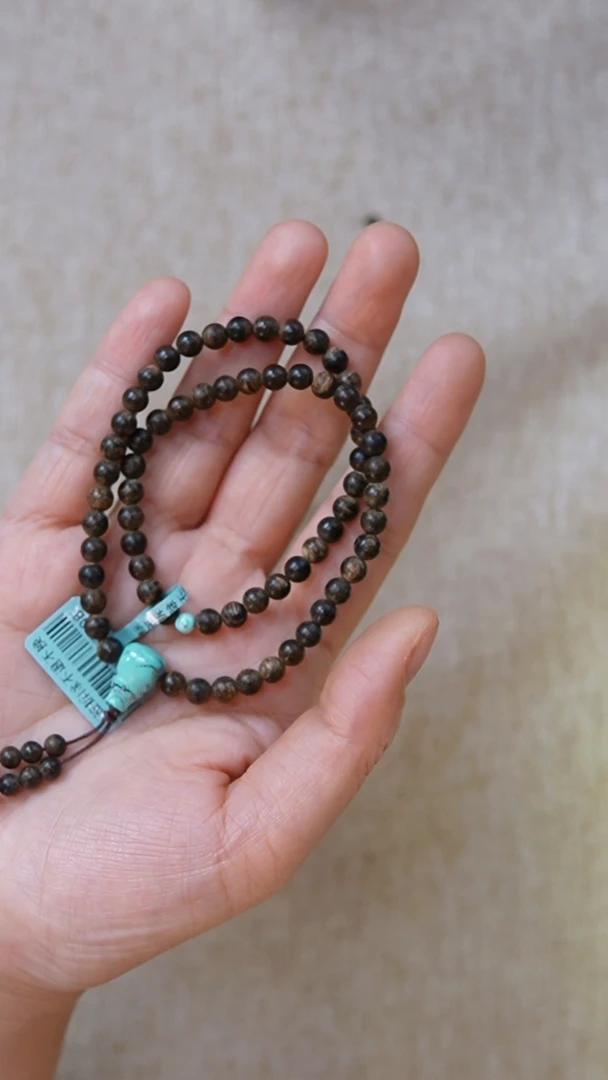 沉香手串老****的文莱黑奇0.5沉水