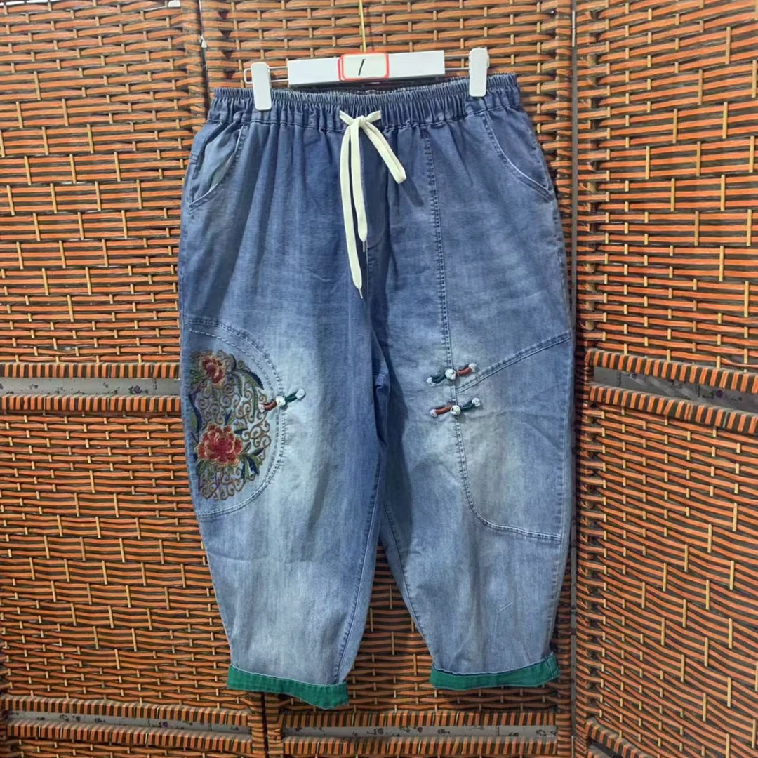 妈妈时尚休闲松紧腰绣花加大加肥大弹薄8分牛仔长裤夏季宽松