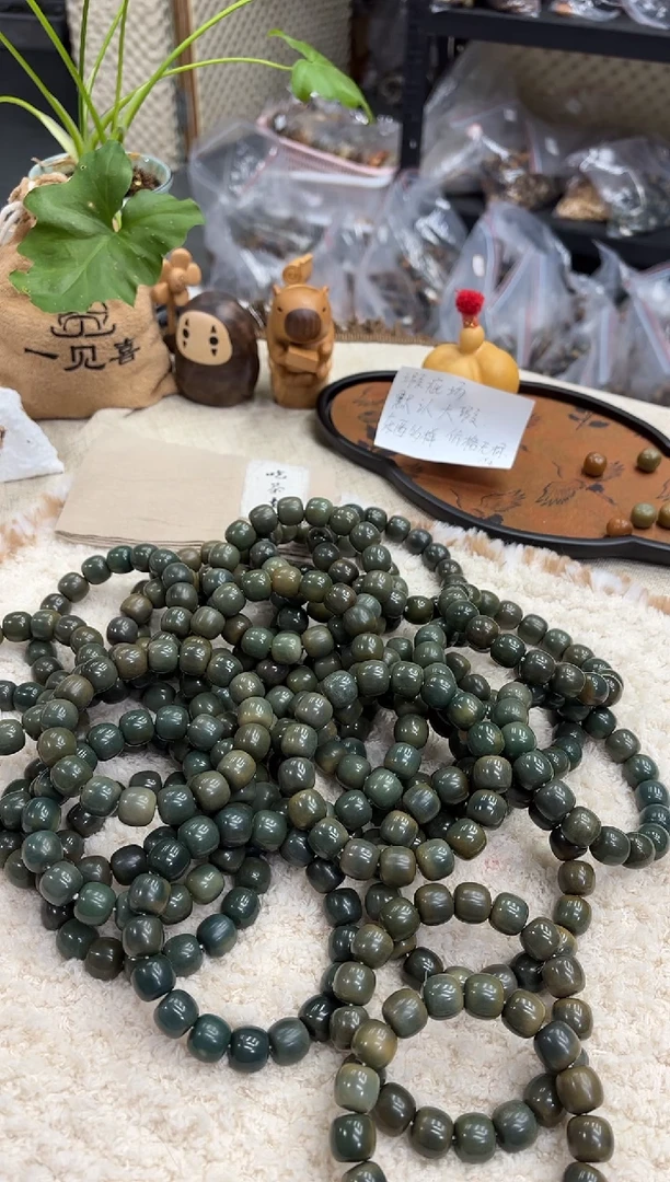 菩提根/象牙果手串15猪油膏瑕疵不挑（612）