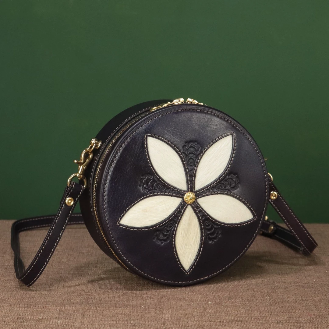 头层植鞣牛皮真皮女士复古小众设计单肩斜挎手工皮具皮雕圆饼包包