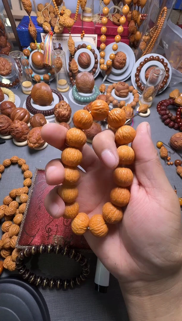 手串橄榄核凤羽的