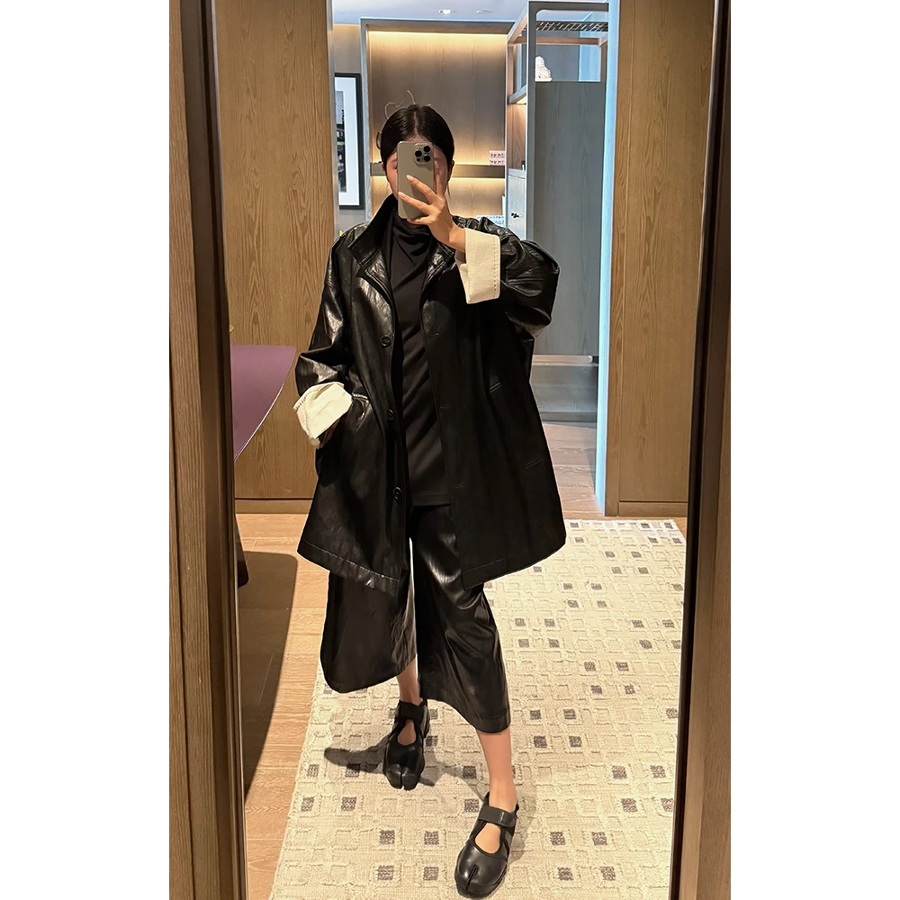 LA CALLA可持续时髦秩序黑白翻袖廓形皮衣 OY-AA6007