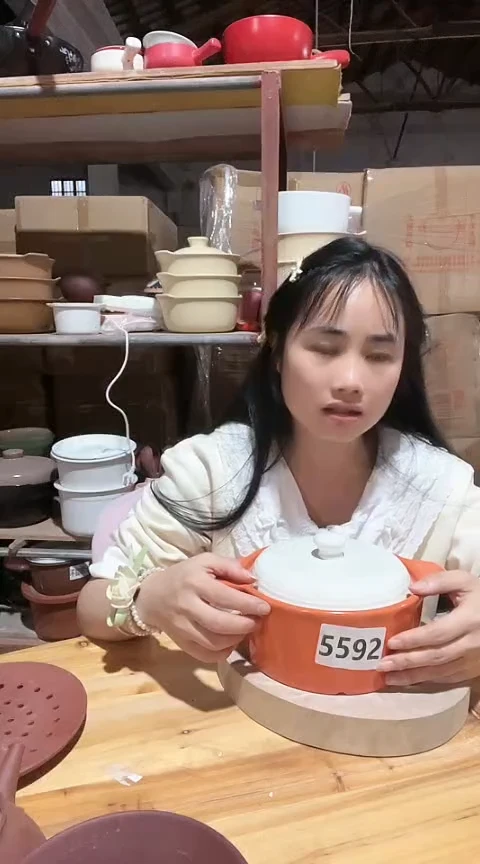 陶5592瑕疵橙色锅带盖