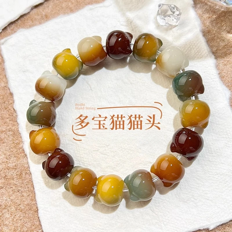 花皮多宝猫头菩提根手串盘玩绕指柔菩提文玩手串