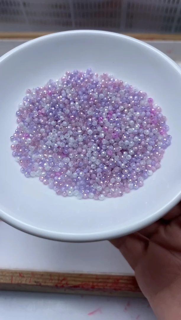 散珠天然锆石未镶嵌D716 粉紫锆石2mm100个9.9元