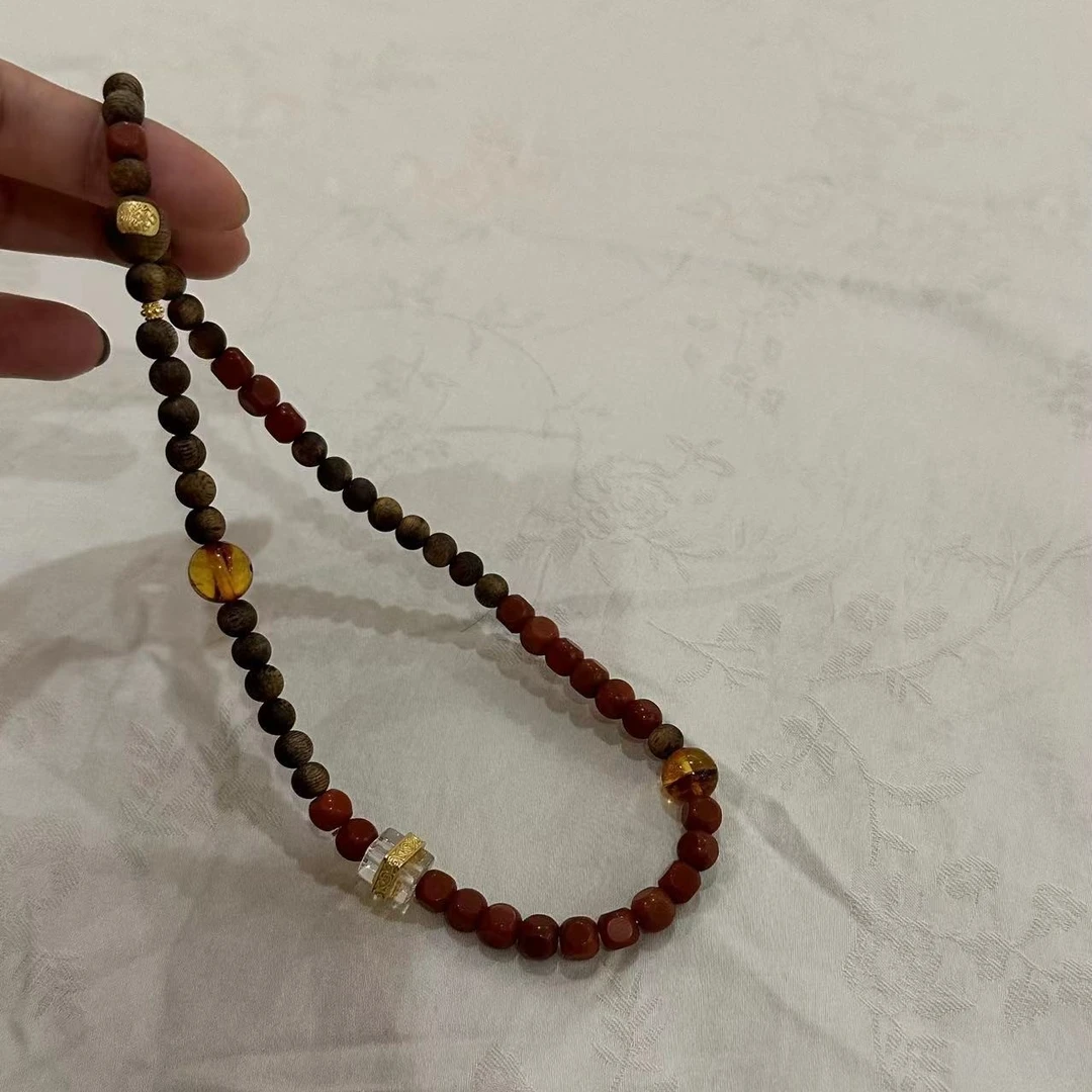 月球来信 沉香005海南莺歌绿棋楠0.6圆珠南红白水晶设计手串·定制