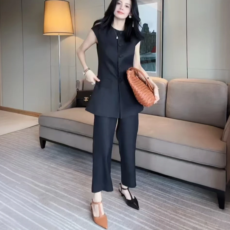 2025夏季新款女极简风时尚套装百搭砍袖单排扣中长衫休闲裤两件套