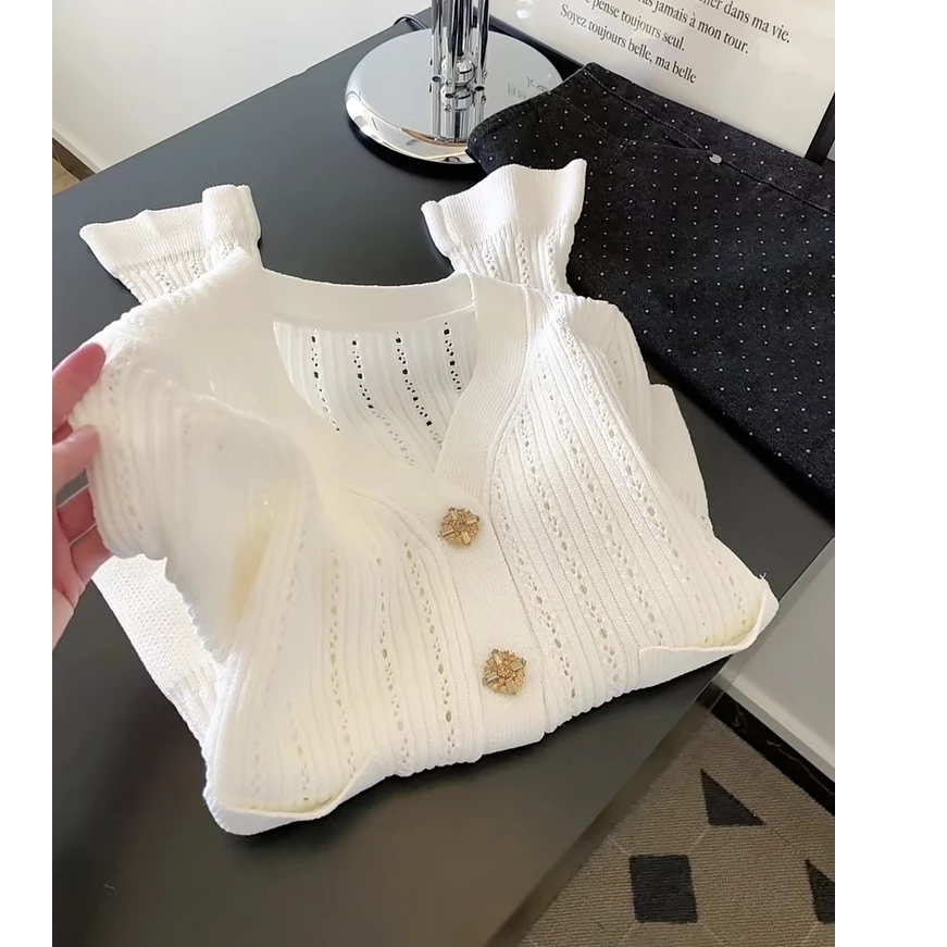 小香风V领白色镂空针织开衫女2025年爆款秋季新款减龄内搭上衣
