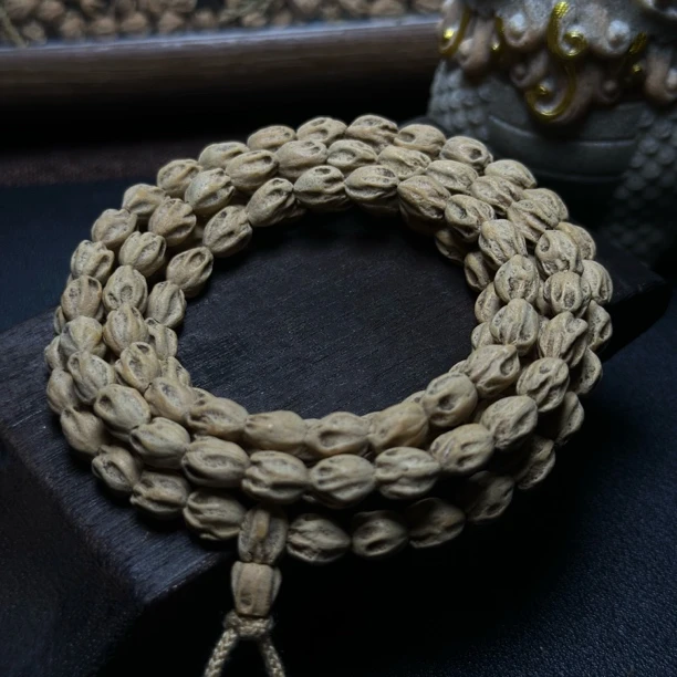 热振百香籽手串【枯骨】长腿原桩高桩鬼脸深坑高油密108长串文玩