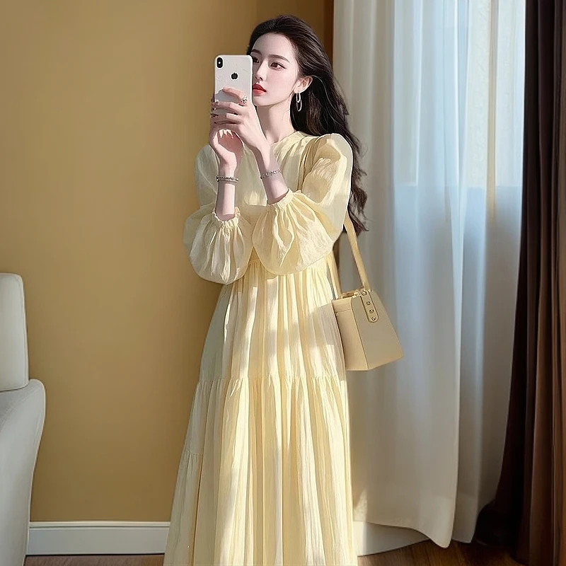 2025早春新款时尚法式度假风仙女气质长裙黄色宽松显瘦连衣裙女