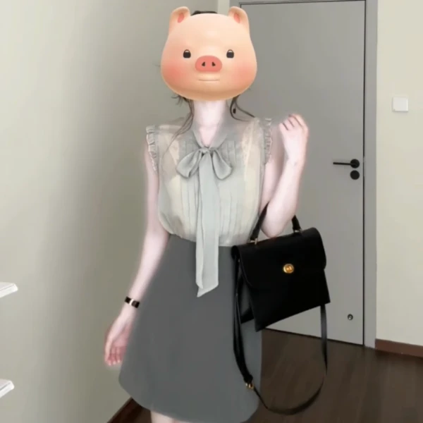 飞飞袖蝴蝶结上衣设计感小众女夏季新款高腰半身裙两件套装406-21