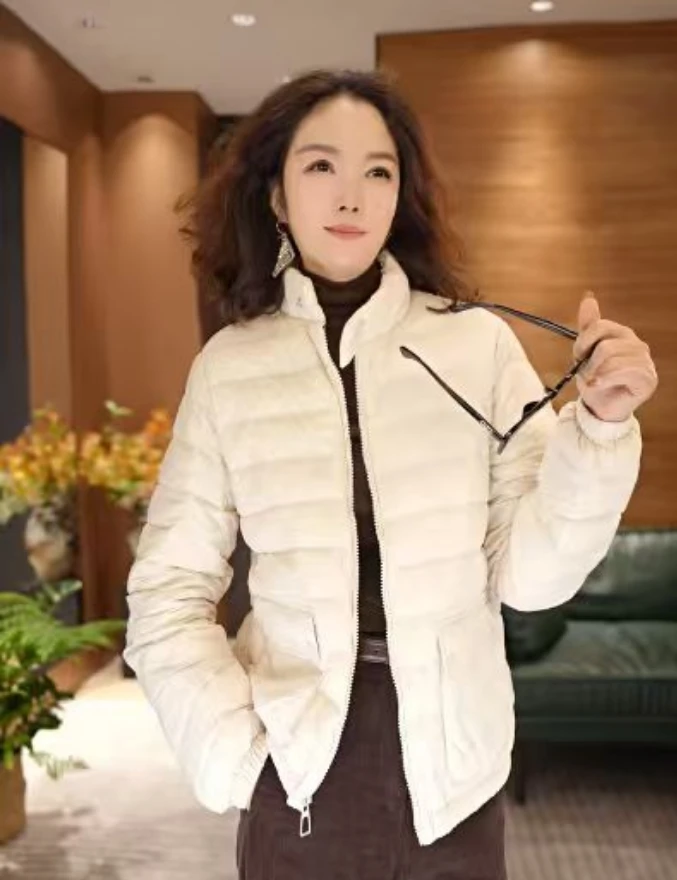 90绒2025新款立领口袋轻薄款白鸭绒冬季羽绒服女短款