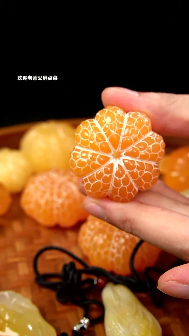 印尼石小桔子手把件