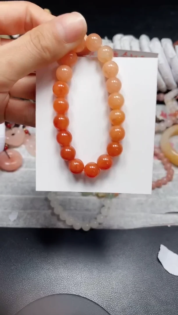 【闪购商品】石英质玉手链未镶嵌柿子红卡10