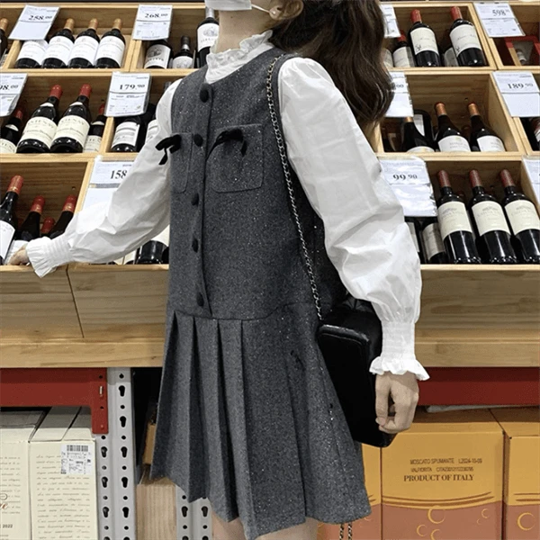 【巴韩】玲姐家6118时尚重工镶钻羽毛流苏针织马甲+长袖衬衫两件套