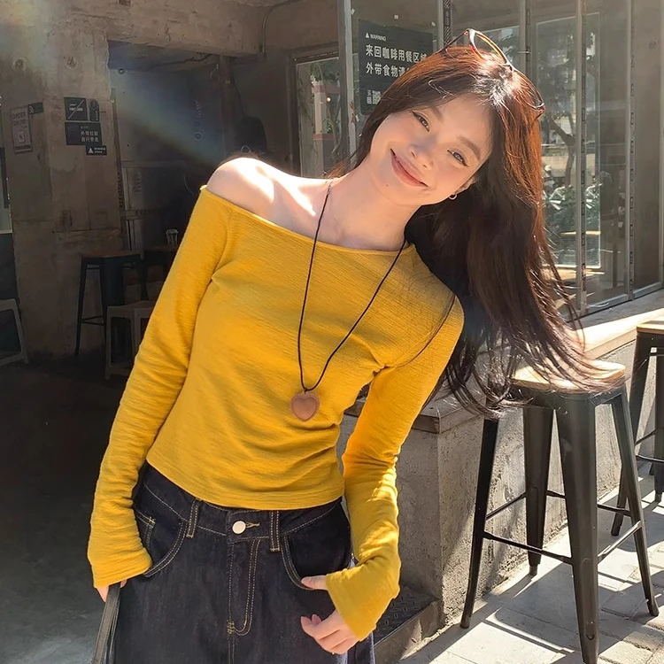 黄色绝美斜肩长袖t恤女春季新款修身显瘦内搭打底衫独特小众上衣