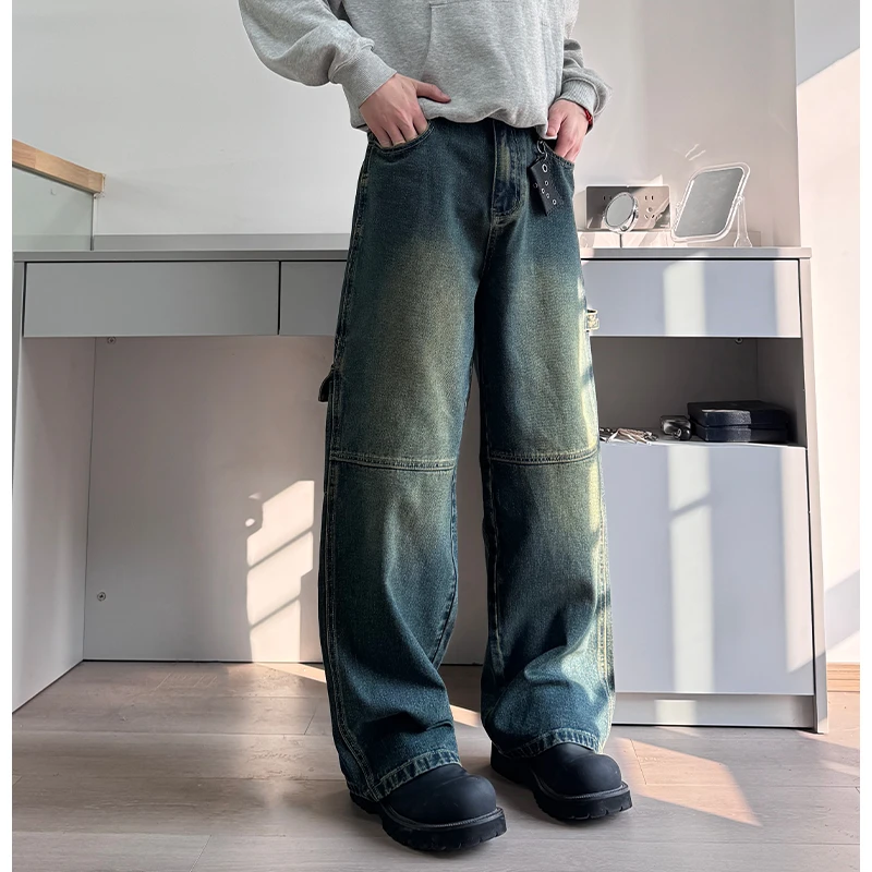 “裁剪拼接 水洗复古”做旧美式休闲牛仔裤宽松直筒复古工装伐木裤