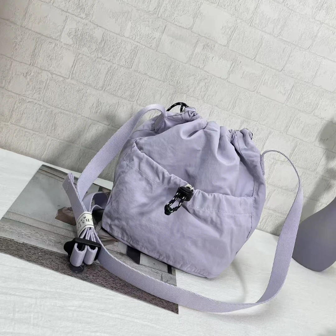 休闲包斜挎包百搭单肩纯色健身包抽带防水户外轻便单肩包165627