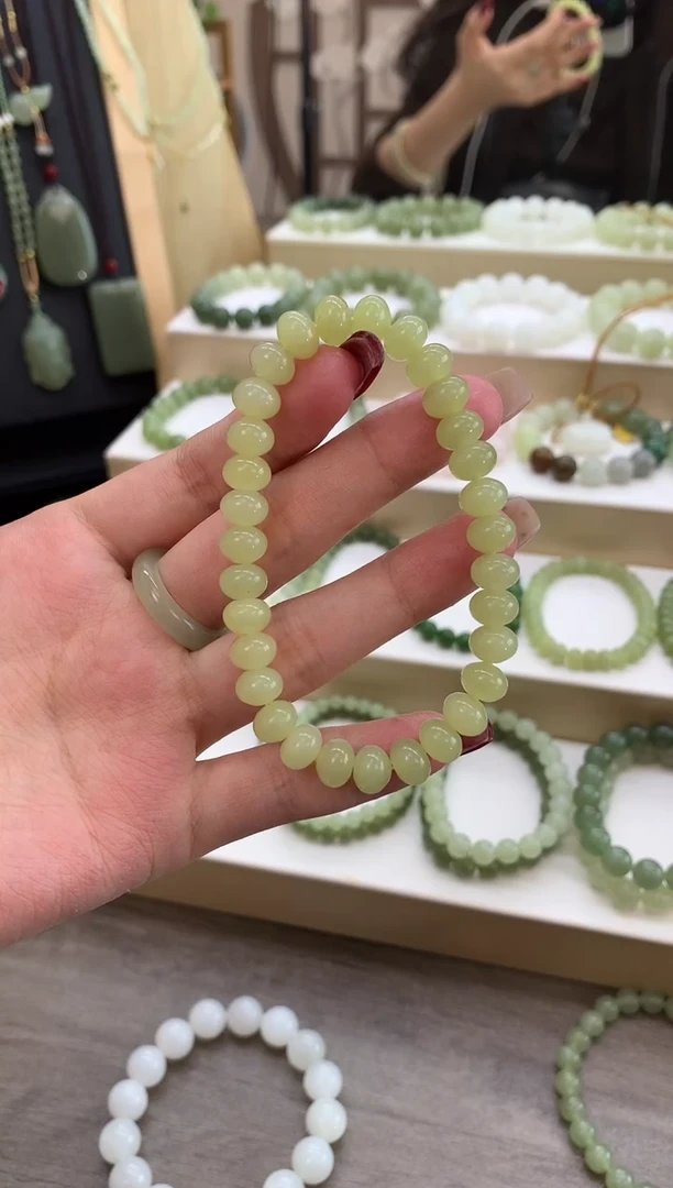 未镶嵌手串和田玉圆*黄口算盘珠