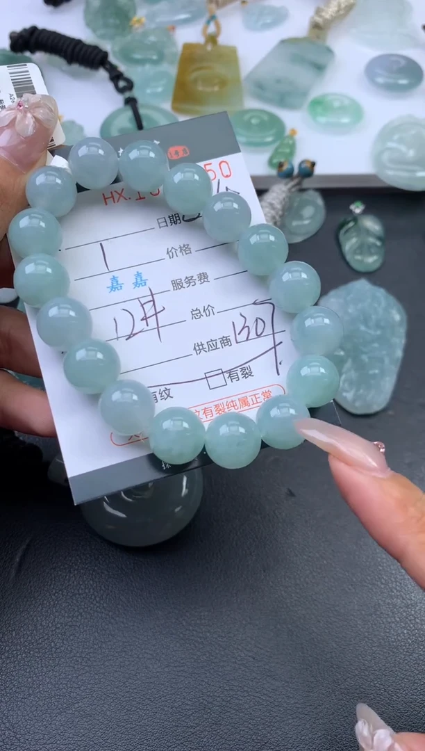 翡翠挂件未镶嵌哈轩 手串1（有纹有裂）