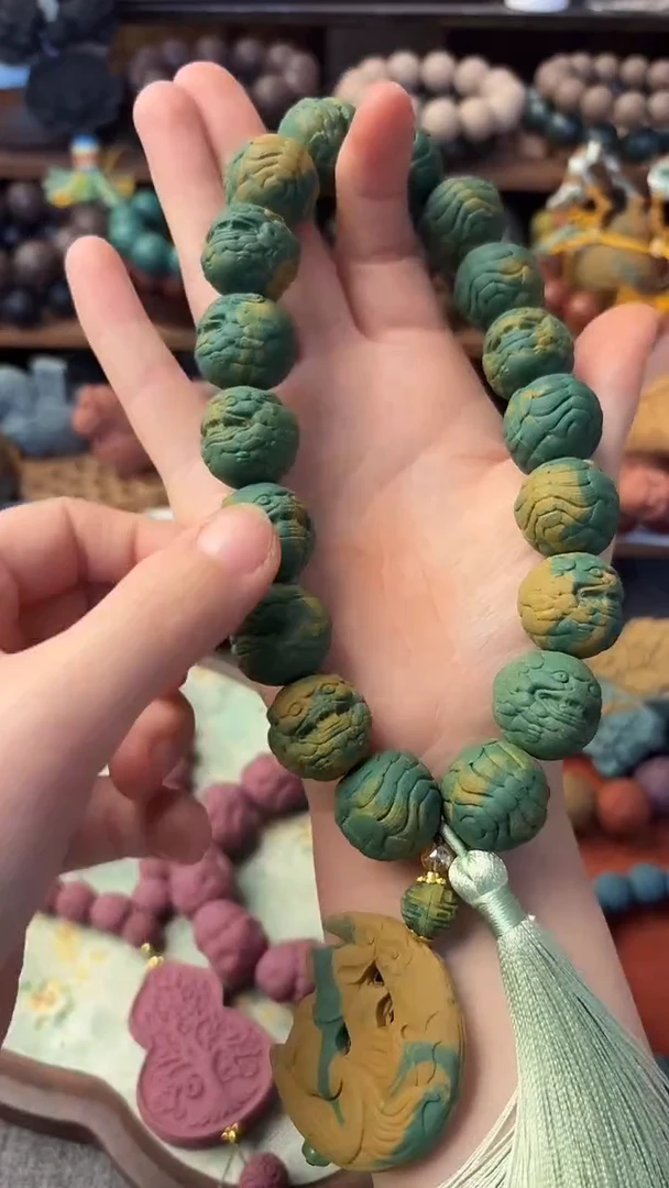 泥塑柚见清茶貔貅手持一条