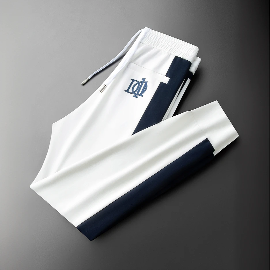 夏季高端时尚潮流撞色拼接冰丝空气层男士修身运动小脚卫裤