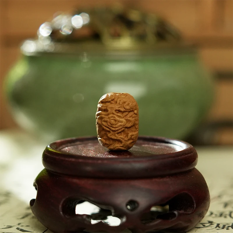 单珠-鹅梨帐中香祥云桶珠