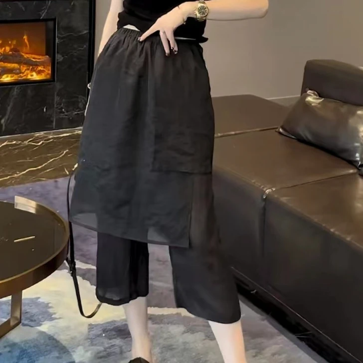 欧货时尚不规则拼纱围裙裤假两件女新夏薄高腰显瘦时尚八分直筒裤