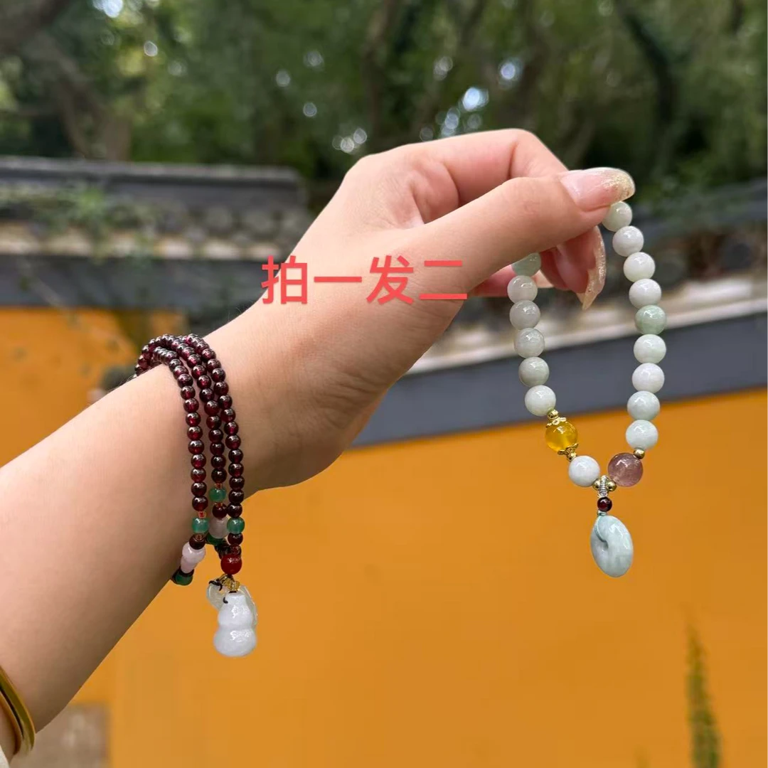普陀山紫牙乌石榴石3圈手串(送翡翠手串）