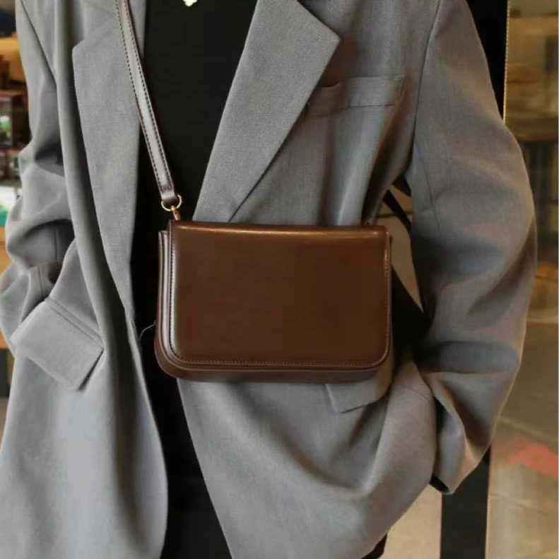 【芝麻集】SKL-A0220-1-咖啡色RAIN.CUN新款简约腋下斜跨女包