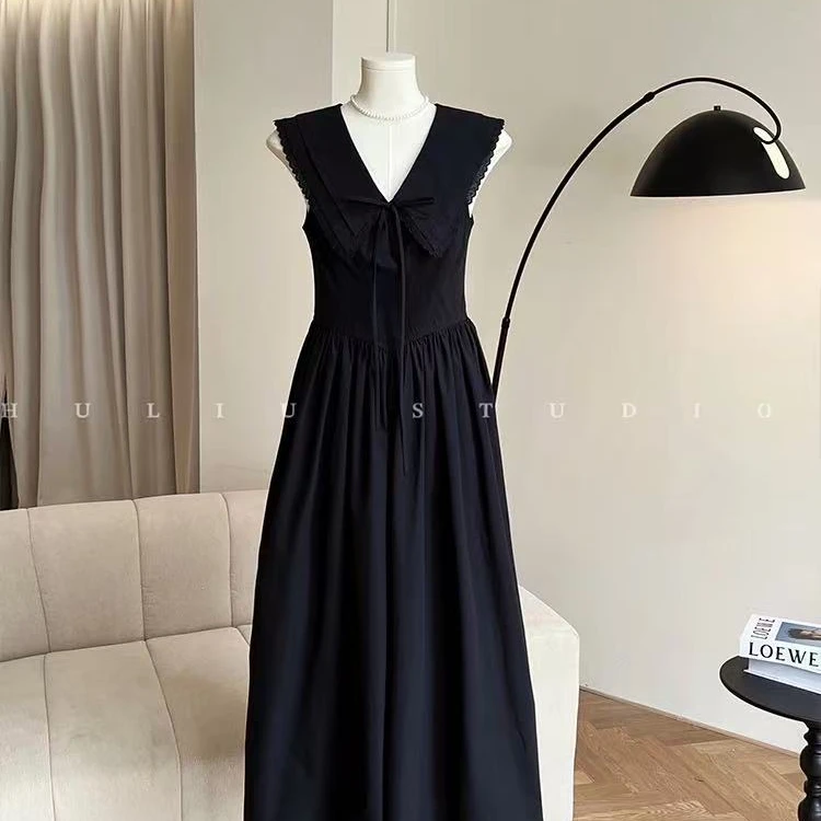 赫本黑色翻领连衣裙系带夏季2025新款法式无袖收腰长裙气质