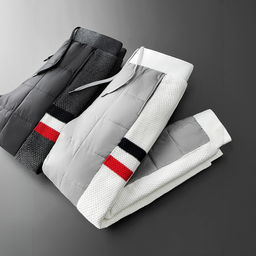 冬季御寒保暖加厚羽绒棉裤帅气针织拼接显瘦男士小脚外穿休闲棉裤