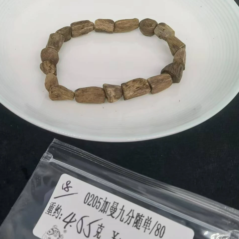 重约4.55克   0205加曼九分随单/80 （单） 天然木艺