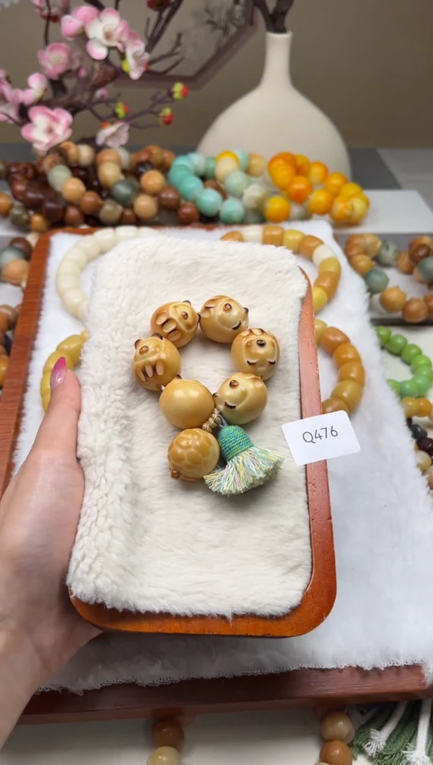 菩提根/象牙果吊坠R****n瑕WQ476鸡蛋猪手捻20+mm一串