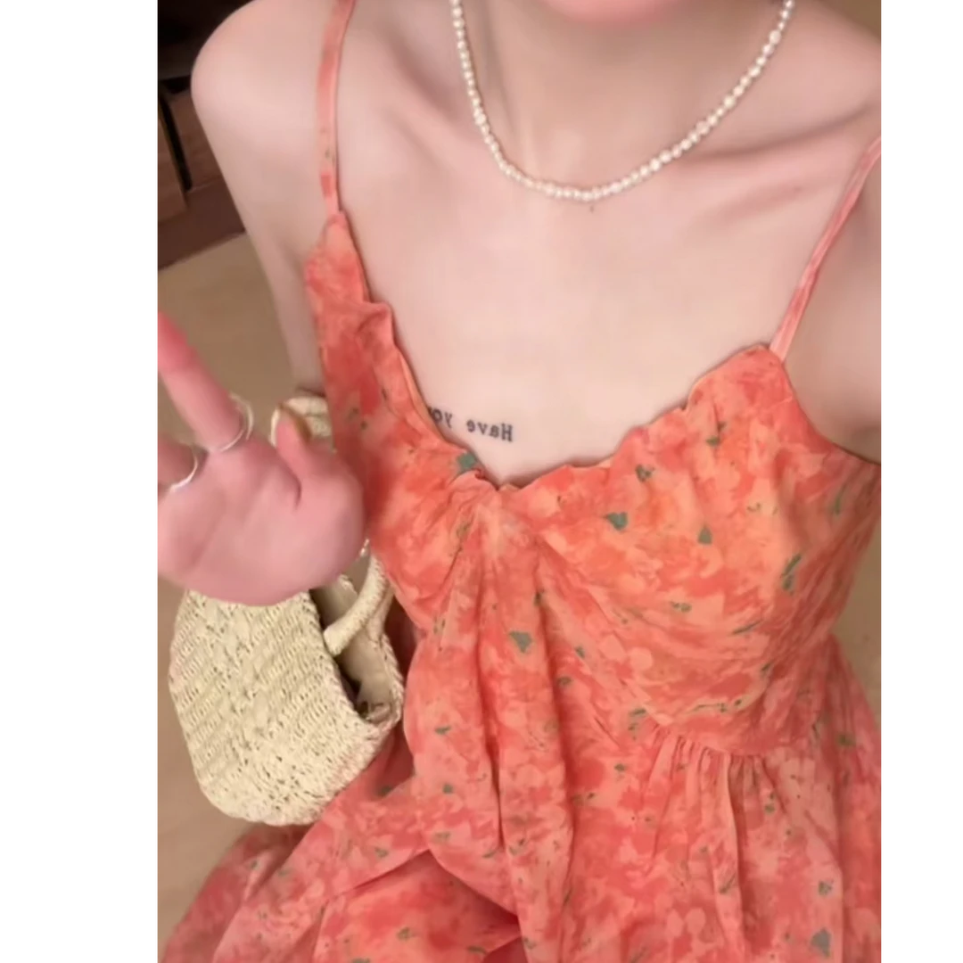 2025夏季上新落日法式海边显白活力橘色吊带裙