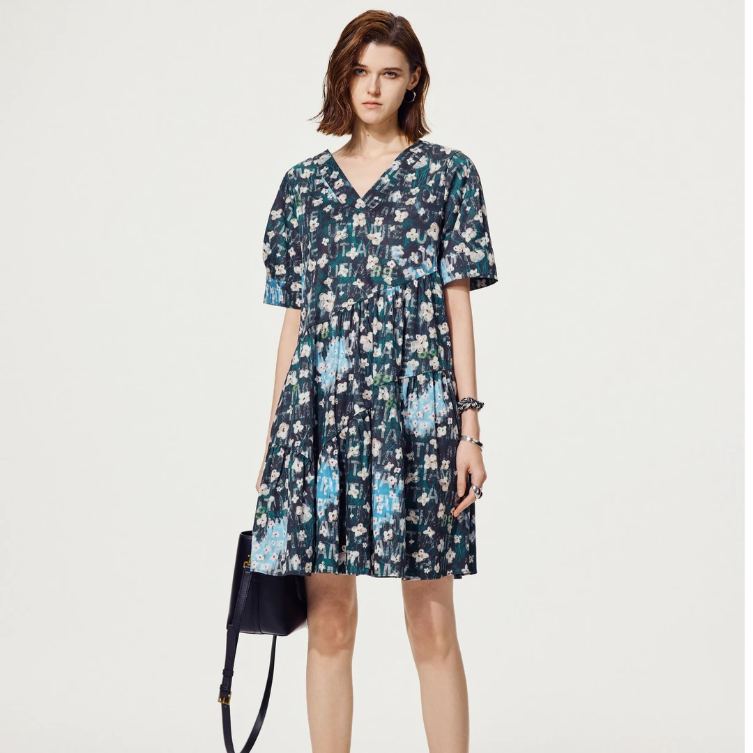 U/TI 莱赛尔高定混纺度假风碎花暗纹字母透气显瘦蓝花中长娃娃裙