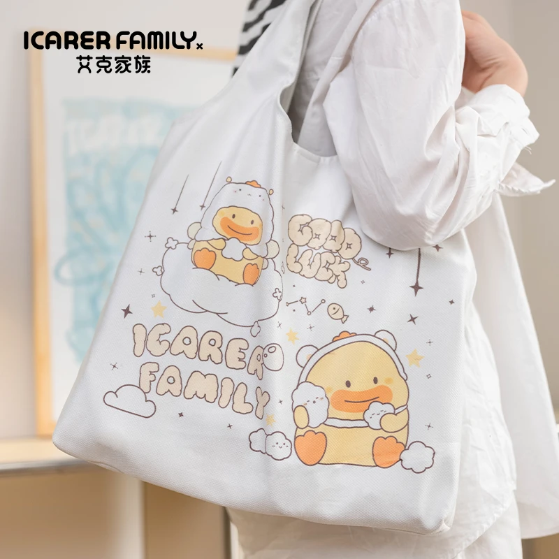 艾克家族DONO可爱帆布包包单肩包女大学生上班通勤帆布补习手提袋