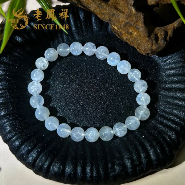 老鳯祥天然水晶奶油体蓝月光 清新蓝色月光石手串标6065