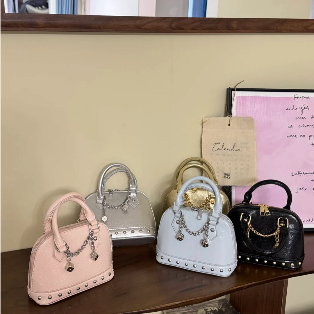 小众设计香槟千金柳钉手提贝壳小包2025新款时尚高级感单肩斜挎包