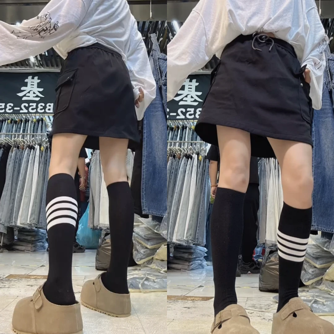 景倩妮黑色双兜设计工装裙2025年春季新款梨形高腰显瘦宽松半身裙