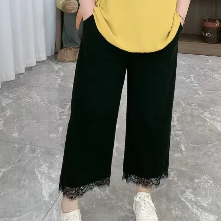 1005牛奶丝拼接蕾丝四面弹速干九分小黑裤