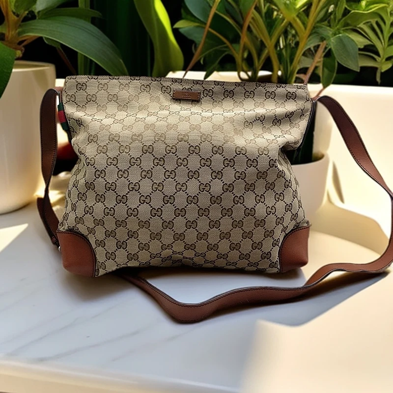 95新 GUCCI/古驰  帆布老花单肩包  1350 9554