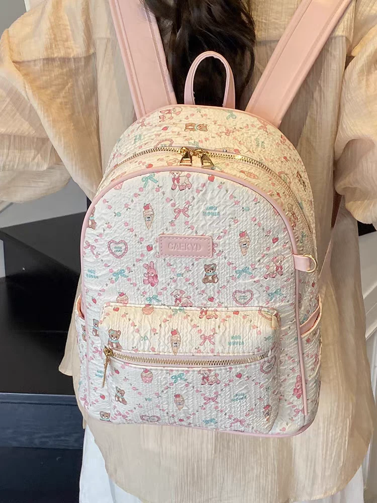 可爱卡通涂鸦双肩包女包潮流高颜值新款时尚印花休闲背包学生简约