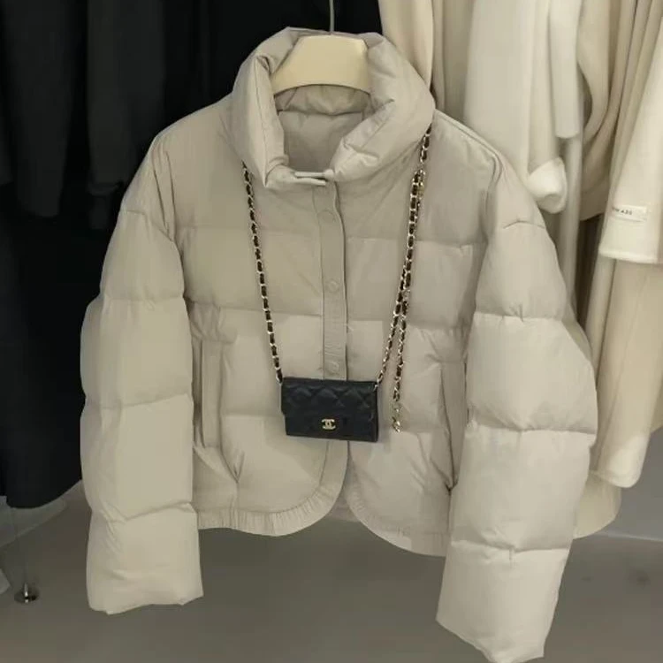 8898温柔糖果色 雨雨下摆弧度外套